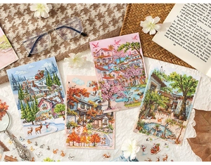 Artistic 3D scene stickers showing four seasons landscapes on a stylish desk background