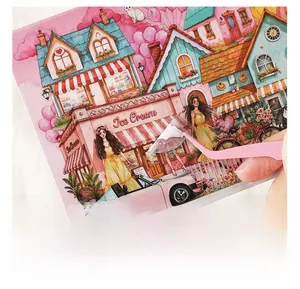 Detail of creative 3D scenery stickers being applied with tweezers on DIY cards