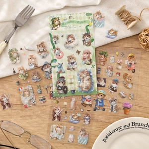 Cute Marmalade Mochi cat stickers set for journaling on a warm wooden background