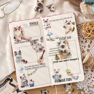Cute cat illustration notebook with grid pages and inspirational quotes for journaling