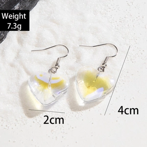 Detail view of red heart pendant earrings with size 2x4cm and weight 7.3g info