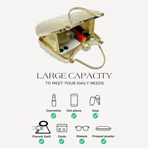 Detail showing the large capacity of this pearl evening clutch bag with interior storage space