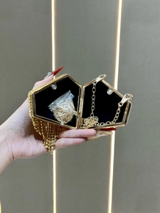 Elegant geometric gold rhinestone evening clutch bag with fringe tassels and chain strap