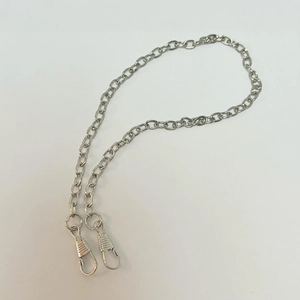 Polished silver metal chain accessory with dual lobster clasps for luxury mini bags