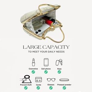 Interior view of pearl and rhinestone clutch bag showing large capacity for essentials