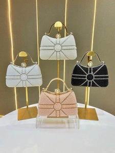 Elegant pearl evening handbags with rhinestones and gold handles in three colors