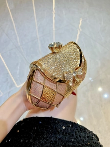 Luxury rhinestone evening clutch bag with crystal lock and bow accent for parties