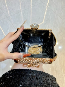 Golden rhinestone bow evening clutch bag with crystal star clasp and metal chain strap