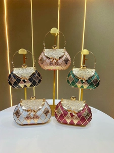 Elegant evening bags with rhinestone bow and metal handles in five vibrant colors
