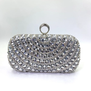 Luxury rhinestone dinner clutch bag with circular crystal patterns and ring clasp
