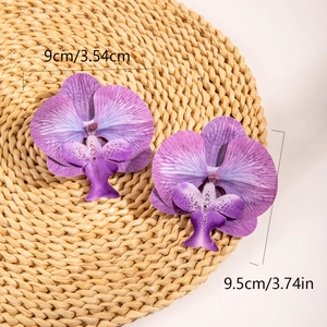 Close-up of purple orchid flower heads with realistic vein textures and size measurements
