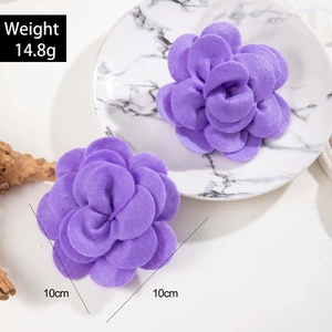 Detail of purple rose earrings with handcrafted felt petals, 10cm diameter, weight 14.8g