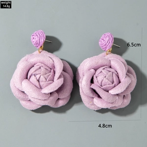 Detail showing dimensions and 14.8g weight of handmade purple rose fabric tassel earrings