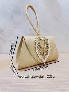 Golden glitter evening handbag with crystal heart detail, 21.5cm length for formal party