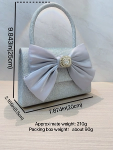 Elegant silver sequin evening clutch bag with lavender satin bow and pearl rhinestone detail