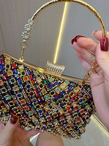 Luxury evening clutch bag with colorful rhinestones and gold circular floral handle