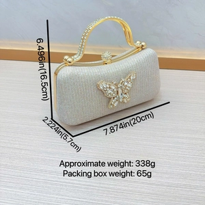 Silver evening clutch with rhinestone butterfly detail and dimensions measurements