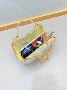 Elegant sparkling silver evening clutch bag with crystal handle and metal chain
