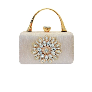Champagne gold evening clutch bag with sparkling glitter and floral rhinestone design