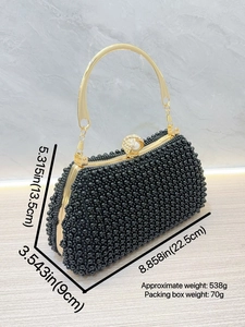 Elegant black pearl evening clutch bag with gold metal handle and dimension details