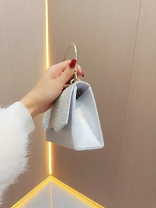 Elegant silver rhinestone evening handbag with a metal handle for wedding parties