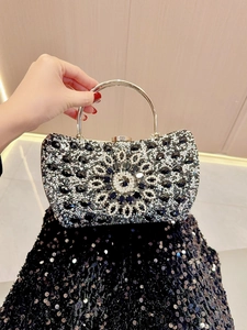 Elegant silver evening clutch bag with sparkling floral rhinestones and metal ring handle