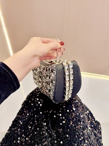 Elegant black sequined evening clutch bag with sparkling rhinestones and metal ring handle