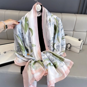 Silk satin summer beach shawl with blue lily floral pattern and pink borders