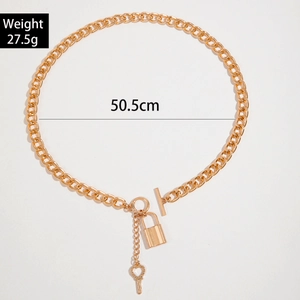 Gold chunky chain necklace with heart key and lock pendant featuring OT buckle closure