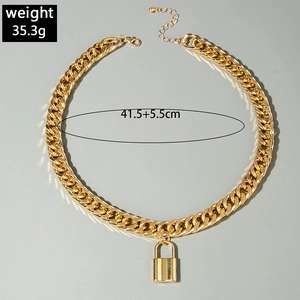 Detail of chunky gold lock necklace showing weight 35.3g and length 41.5cm plus extension