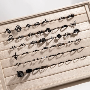 50-piece set of black gothic rings featuring butterfly, snake, and spider motifs