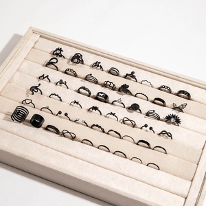 50-piece set of black gothic rings featuring butterfly, snake and heart designs
