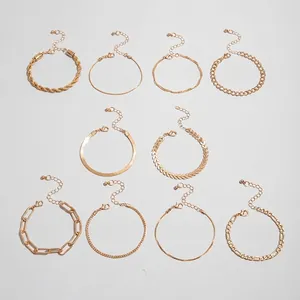 10-piece gold plated bracelet set featuring snake and wheat chain link styles
