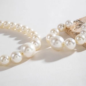 Elegant white pearl jewelry set with graduated beads necklace and bracelet for women