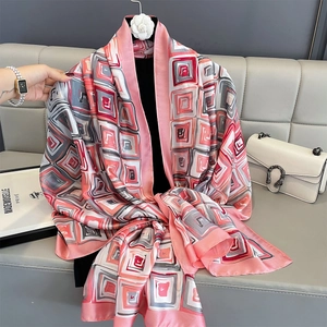 Modern faux silk long scarf with pink geometric print and elegant drape style