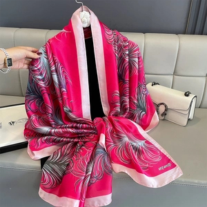 Lightweight magenta sun protection scarf with feather print for summer travel