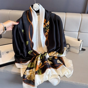 Elegant floral silk scarf in black and yellow with retro European pattern for women