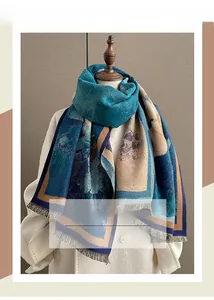 Detail of winter thick scarf with fringe edge on mannequin showing jacquard texture