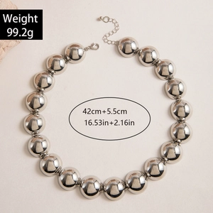Close-up of polished silver metal bead necklace showing clasp and size details