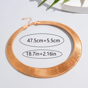 Detail of rose gold metal choker featuring vertical textures and adjustable lobster clasp