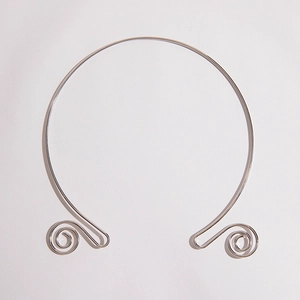 Minimalist silver vintage metal choker necklace with symmetrical spiral curl design