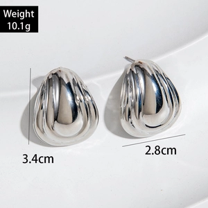 Boucles d'oreilles gouttes argentées avec design torsadé texturé et poids de 10,1 g