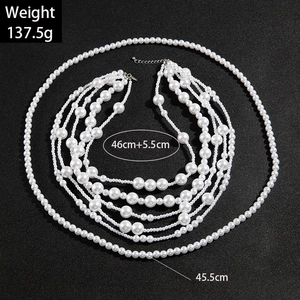 Retro multilayer faux pearl necklace with geometric beads and silver lobster clasp