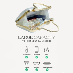Interior detail of white satin evening clutch showing large capacity for makeup and accessories