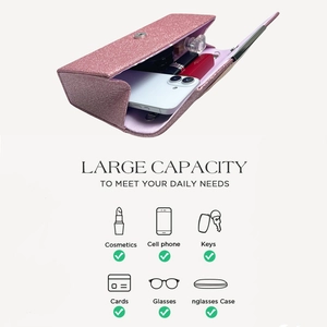 Pink sequin evening clutch interior showing large capacity for phone and cosmetics