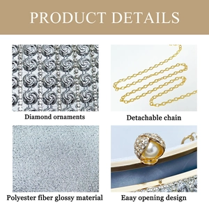 Detail of silver evening clutch with floral diamonds, gold chain and pearl clasp