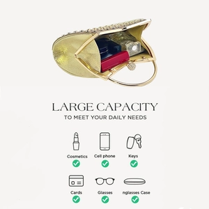 Detailed internal view showing large capacity for cosmetics and phone in a gold evening bag