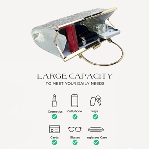 Silver glitter evening bag showing interior space for phone, lipstick, and perfume