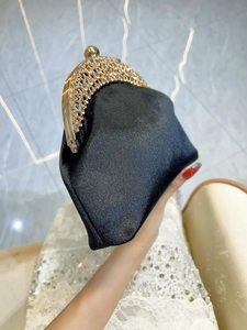 Elegant black satin evening clutch bag with sparkling rhinestone gold metal frame