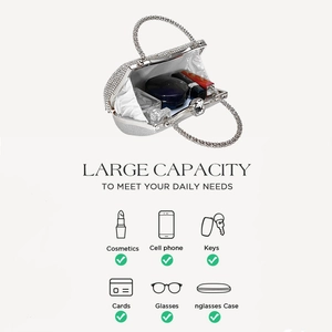 Silver evening clutch interior view showing large capacity for phone and cosmetics